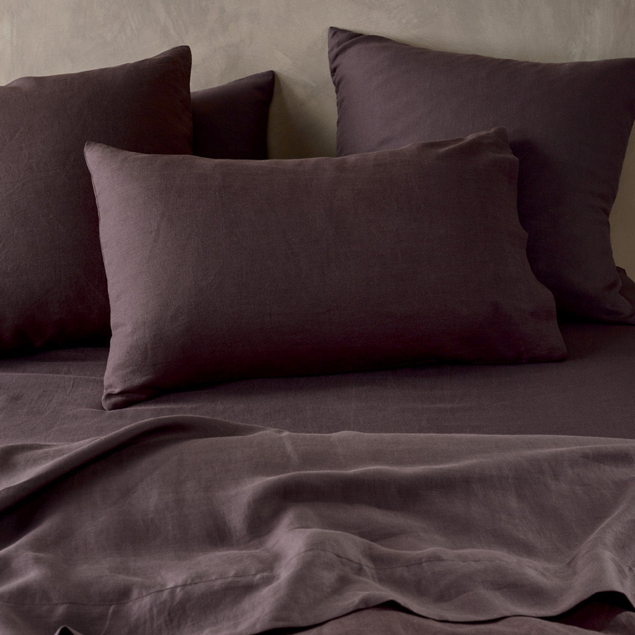 Close up shot of Elayna Espresso Pillowcases on bed
