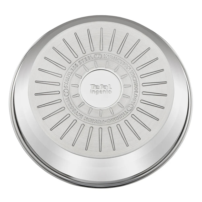 Round metallic object with Tefal branding on a white background