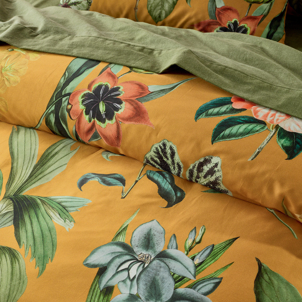 Close up shot of Aletta Quilt Cover on bed