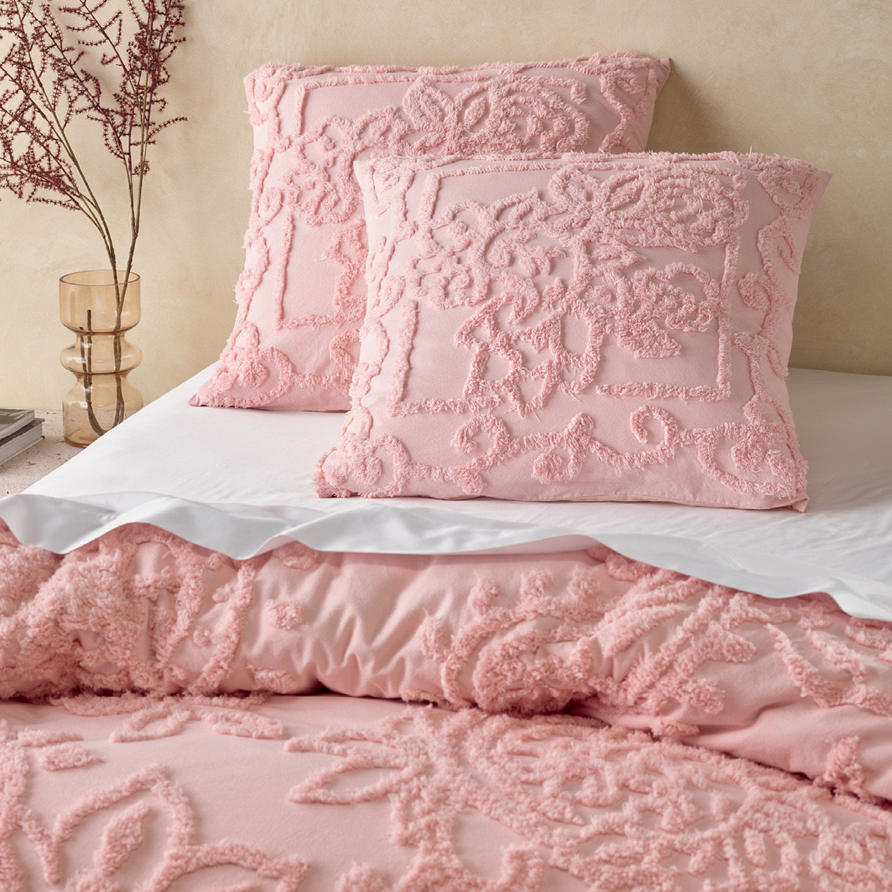Zoomed in shot of Alice Rose European Pillowcases on bed
