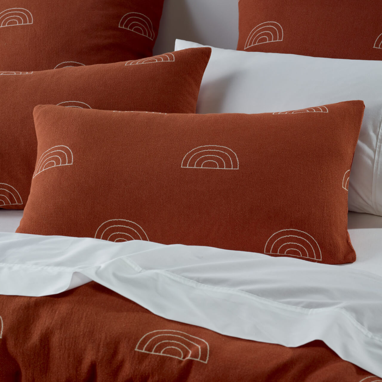 Close up shot of Arco pillowcases on bed
