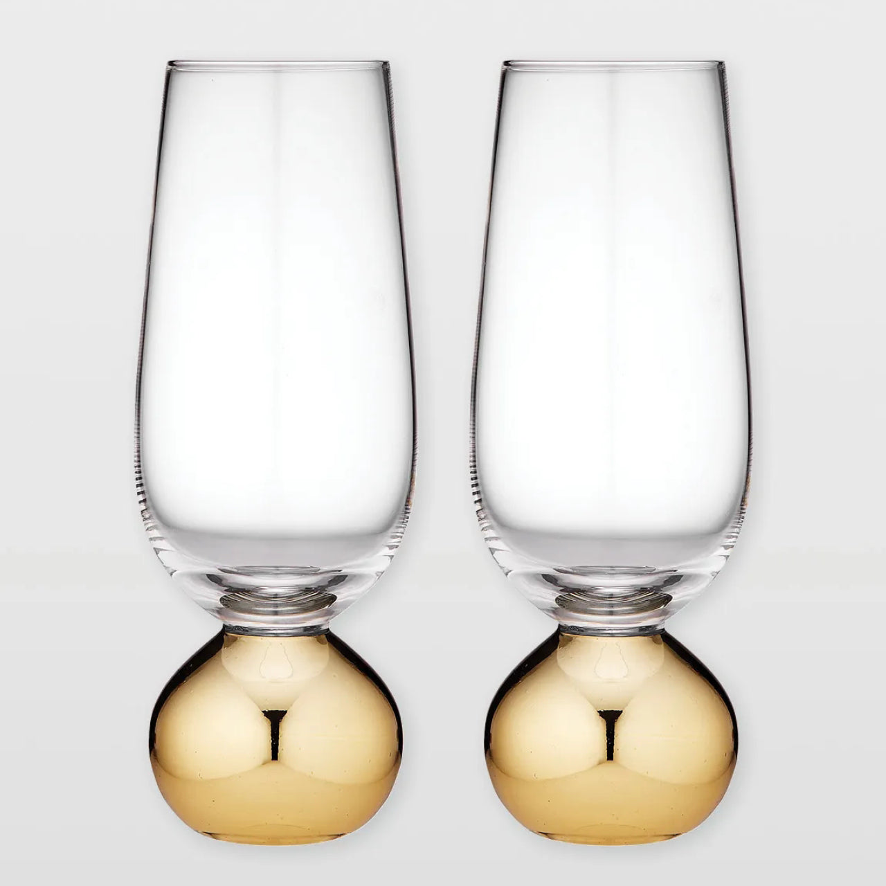 Astrid Champagne Glass Gold on a white background