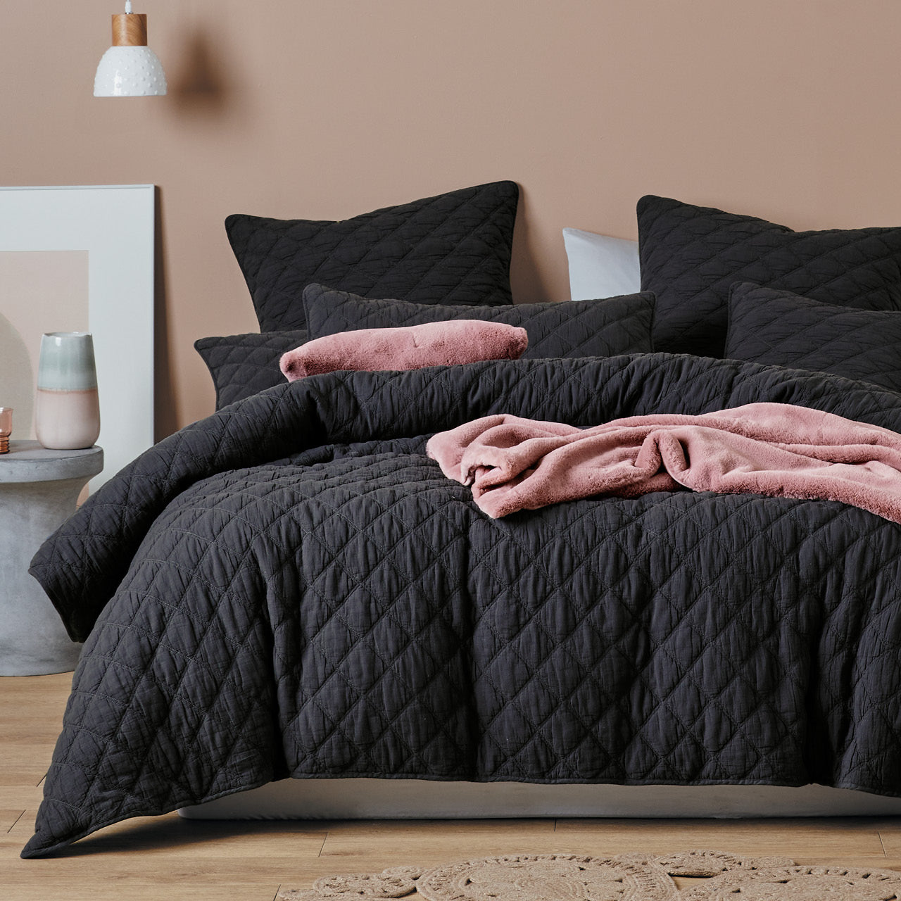 Zoomed out shot of Austin Charcoal Quilt Cover Set on bed