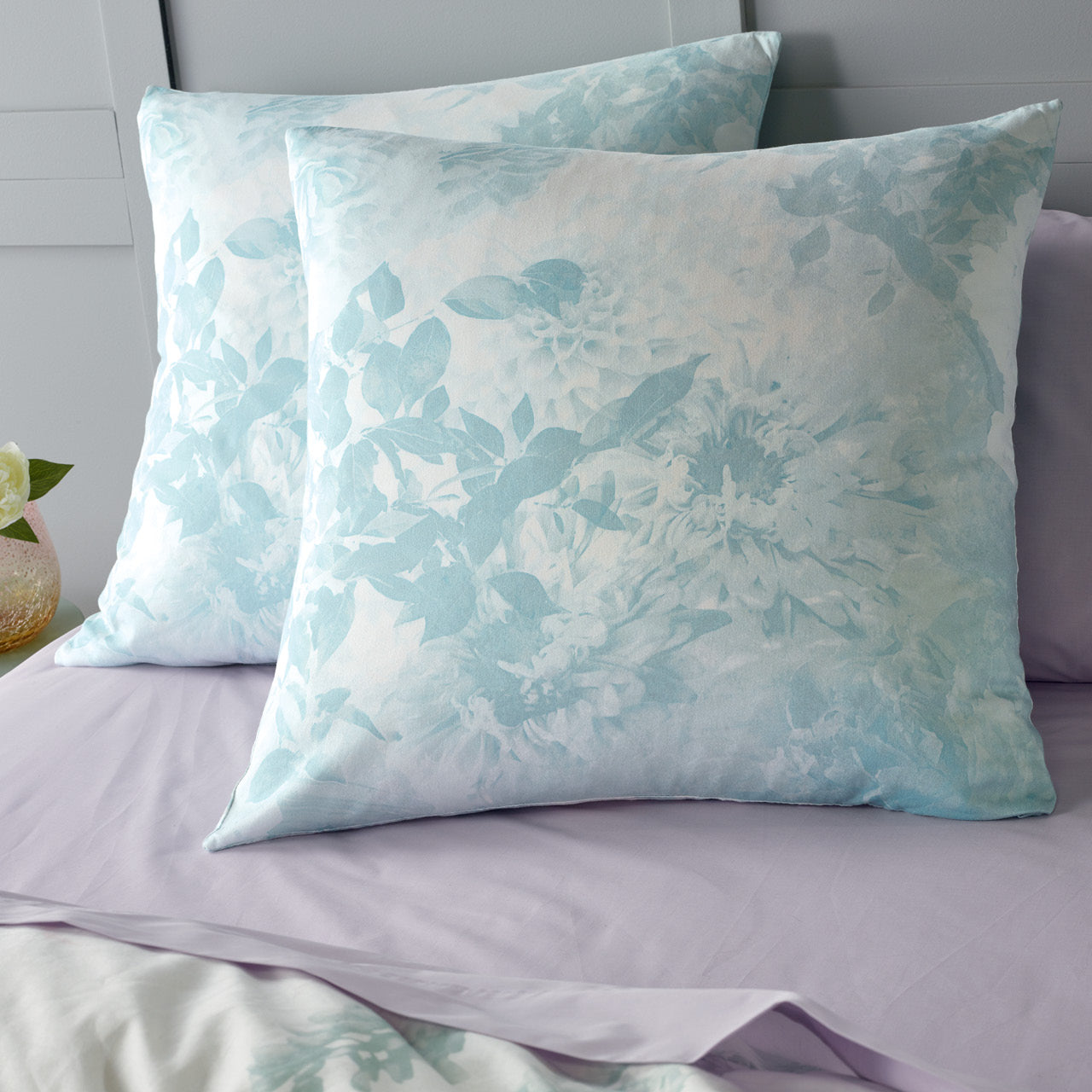 Zoomed in shot of Aveline European Pillowcases on bed