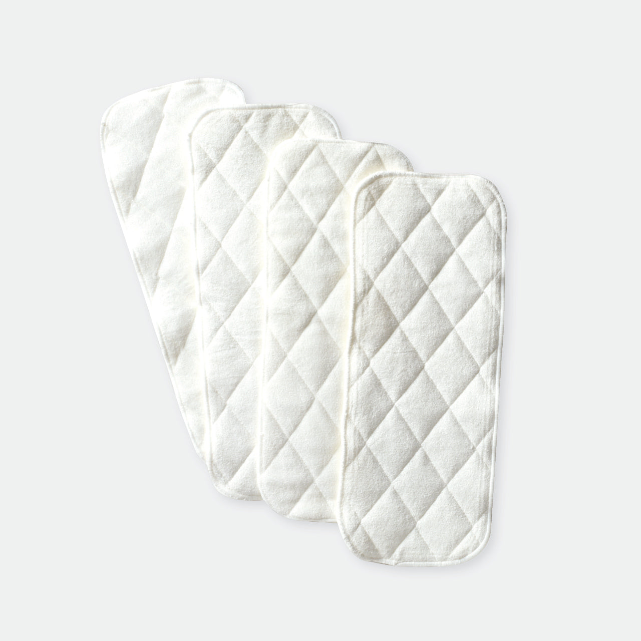 Nappy liners on a white background