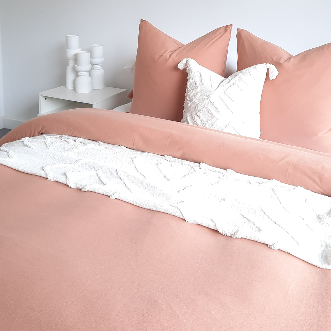 Zoomed in shot of Bailey Quilt Cover Set styled on bed