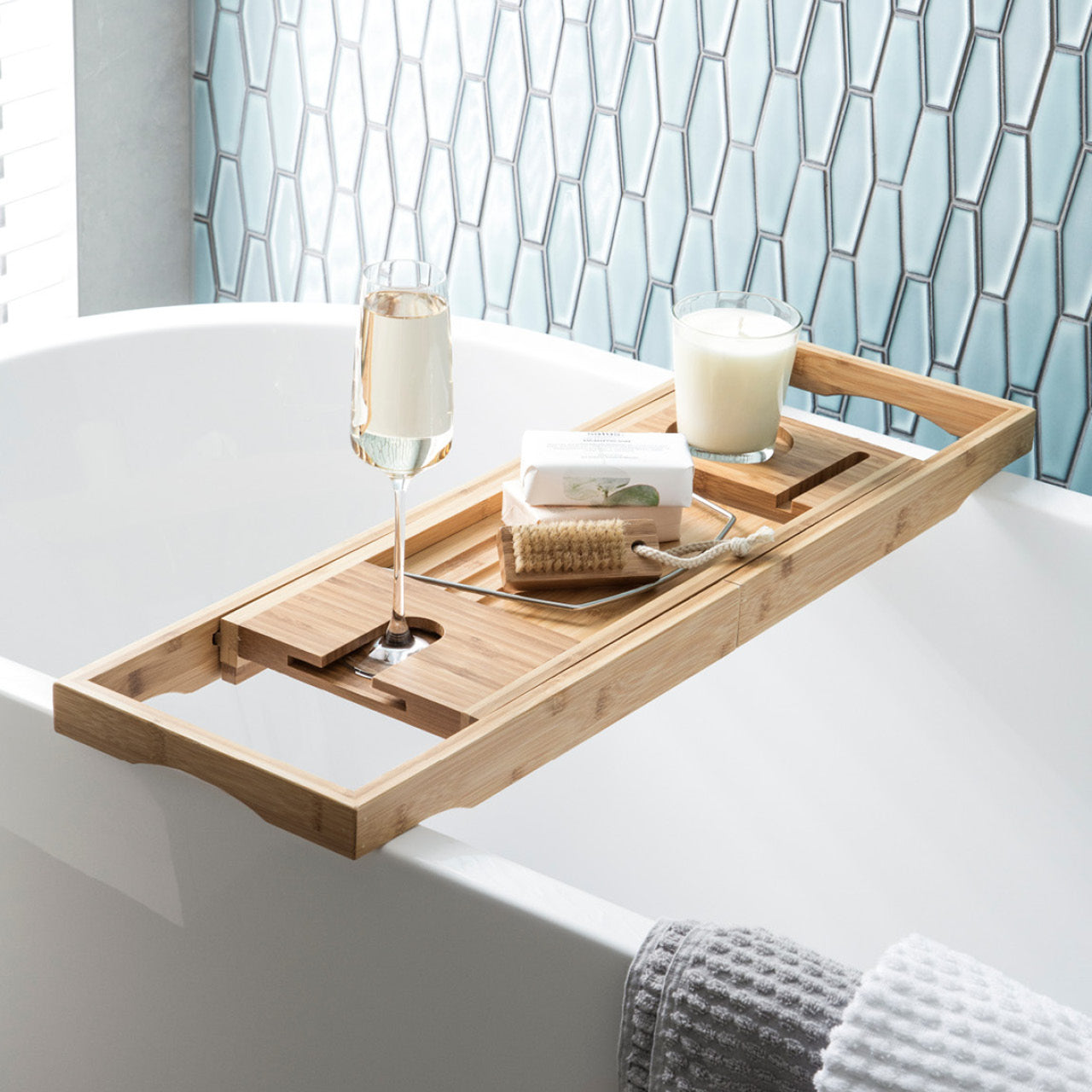 Bamboo Bath Caddy over bath with glass of wine
