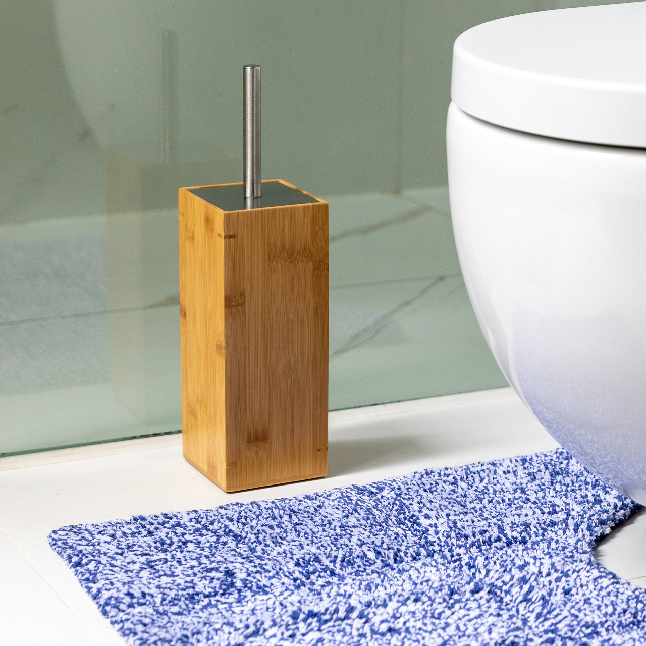 Bamboo Toilet Brush next to toilet and tufted contour mat