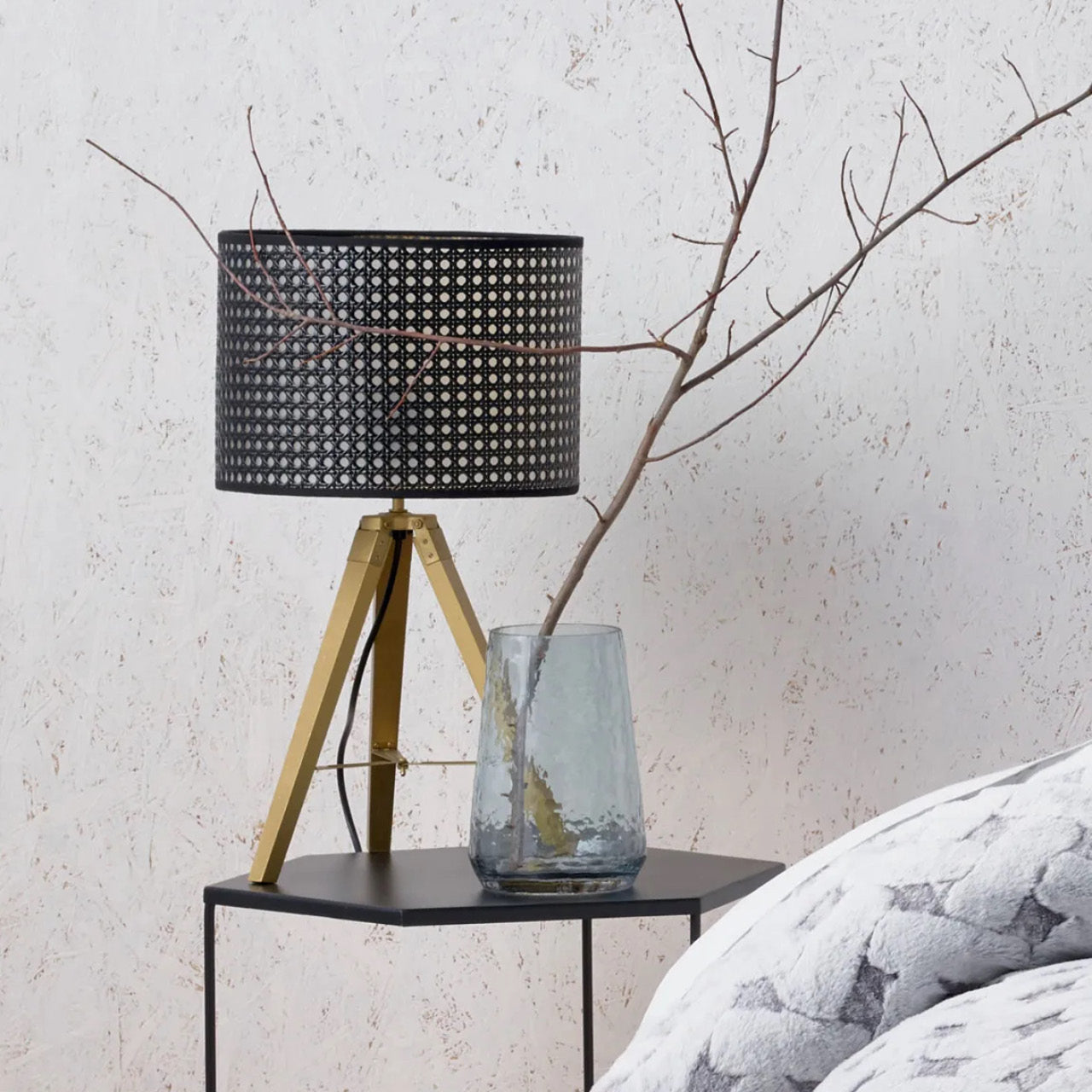 Chester Lamp on table next to bed with Luminous vase and plant
