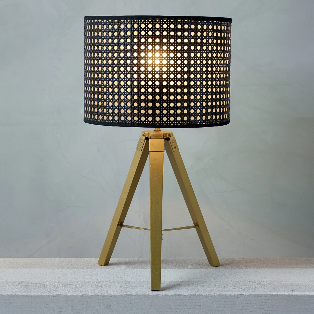 Chester Lamp turned on sitting on a ledge