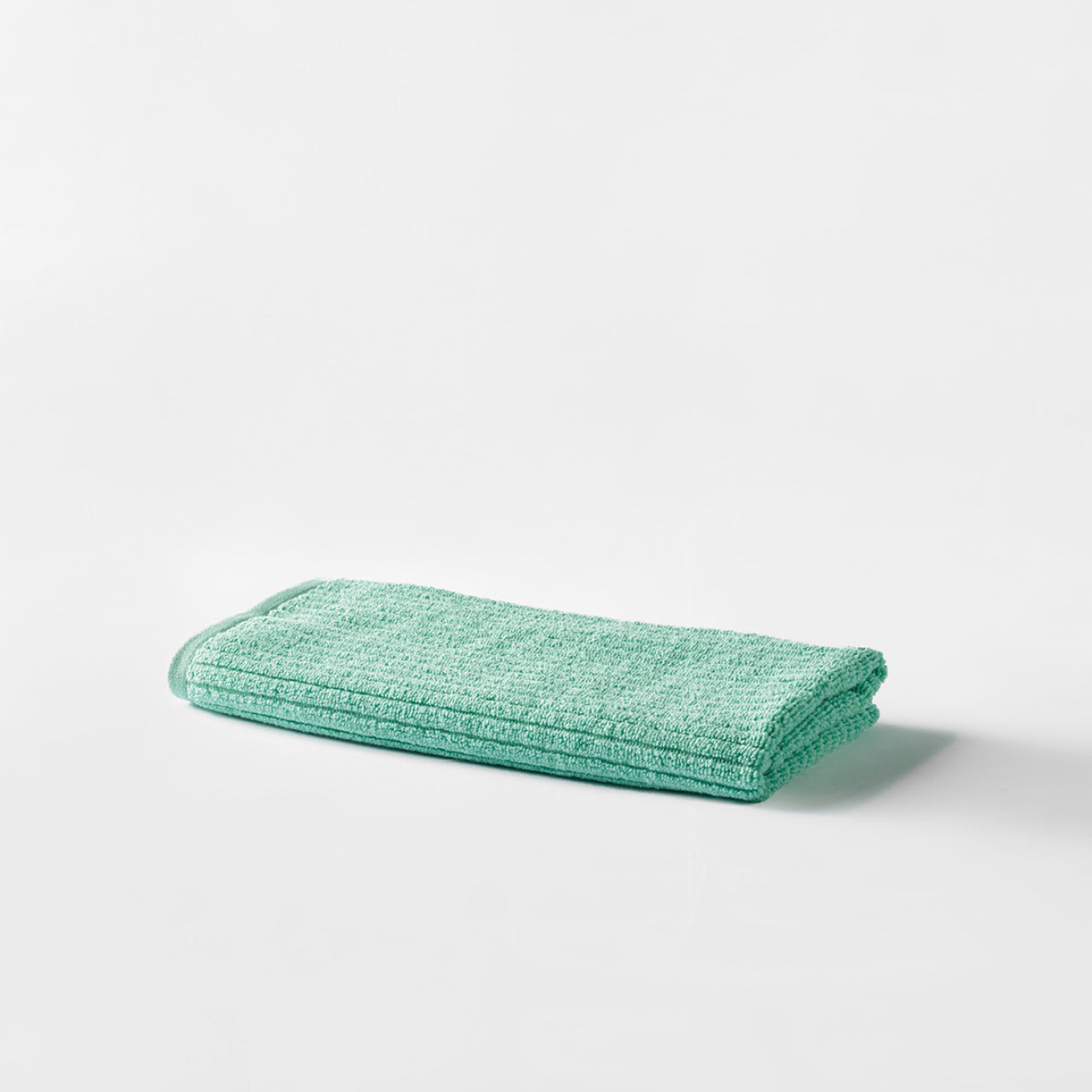 Cooper Rib Hand Towel Mint on a white background