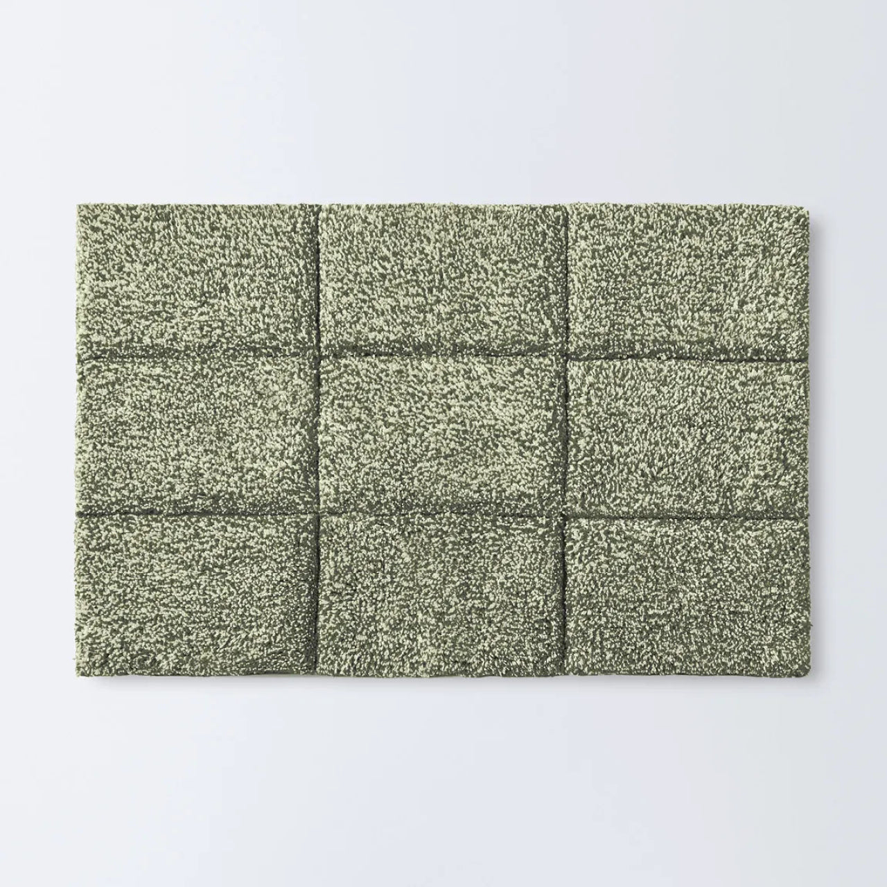 Cooper Tufted Bath Mat Avocado on a white background