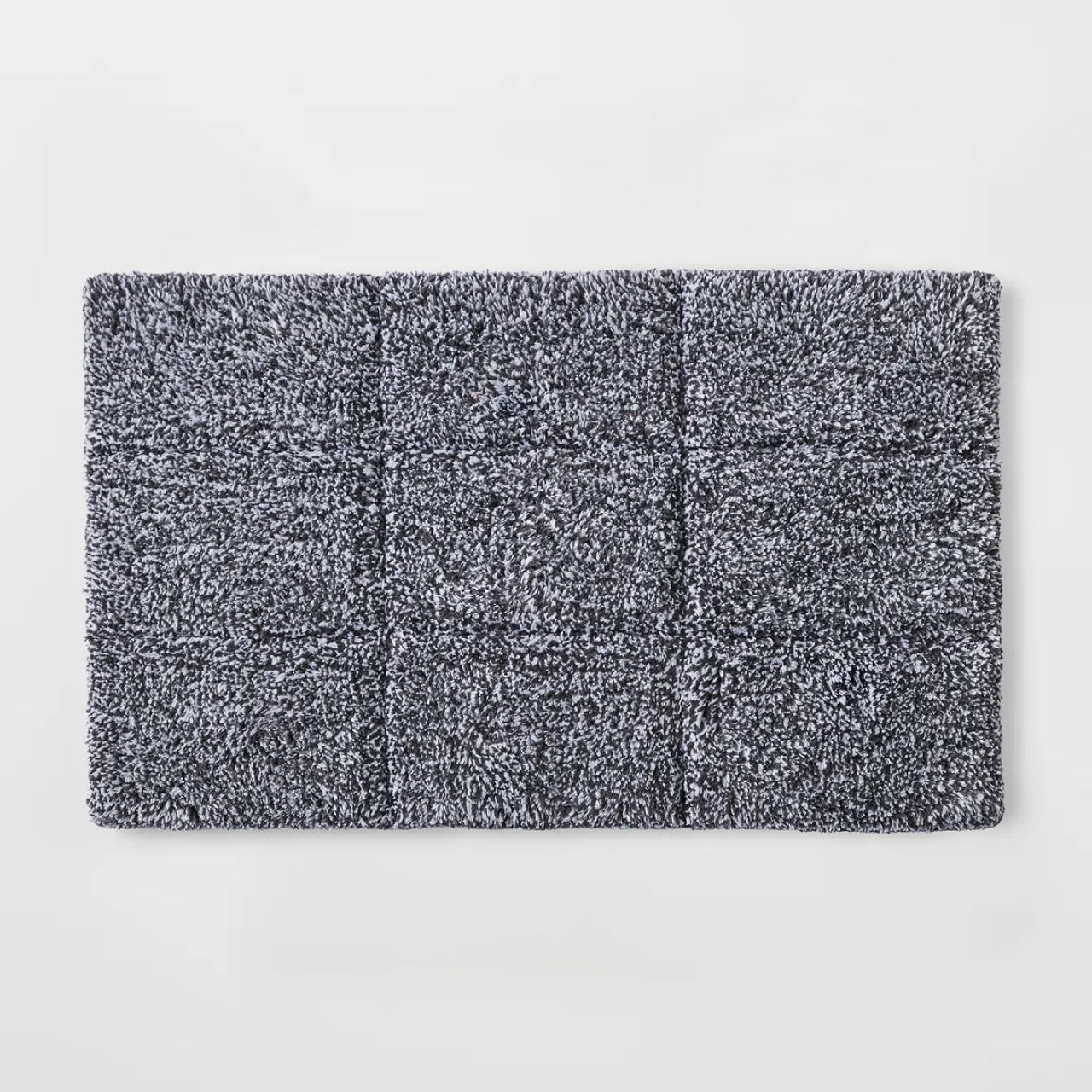 Cooper Tufted Charcoal Bath Mat on a white background
