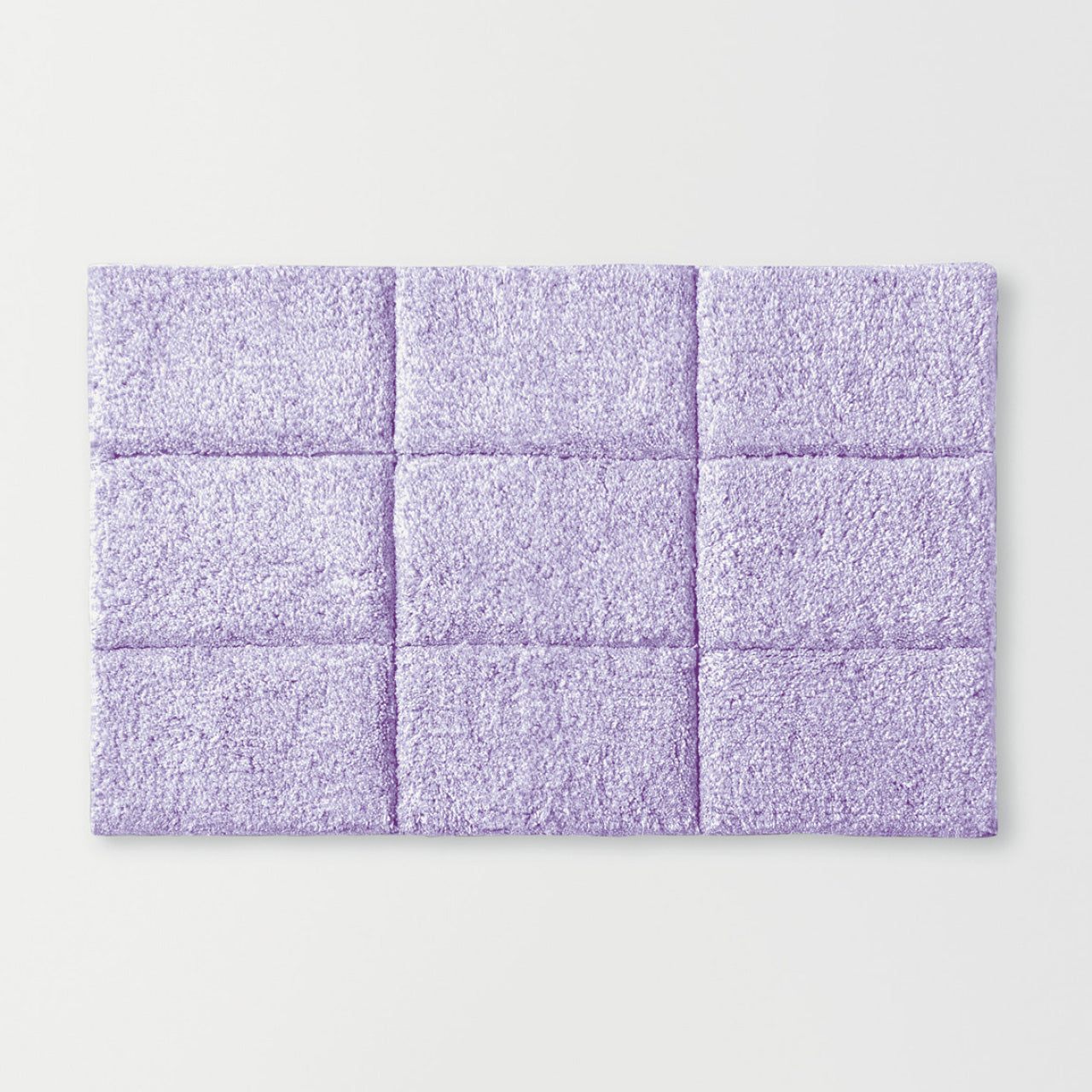 Cooper Tufted Bath Mat Lavender on a white background