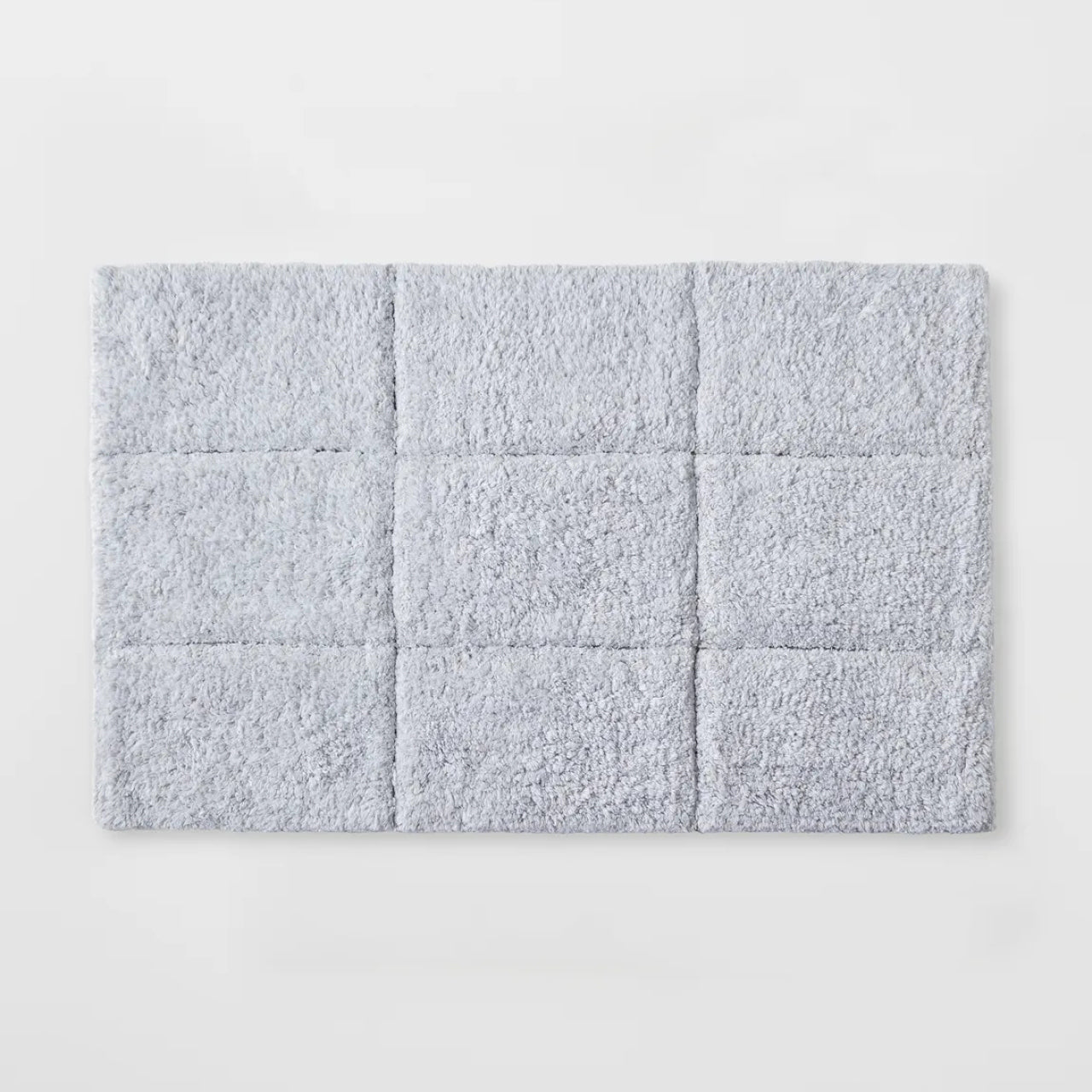 Cooper Tufted Bath Mat Silver on a white background