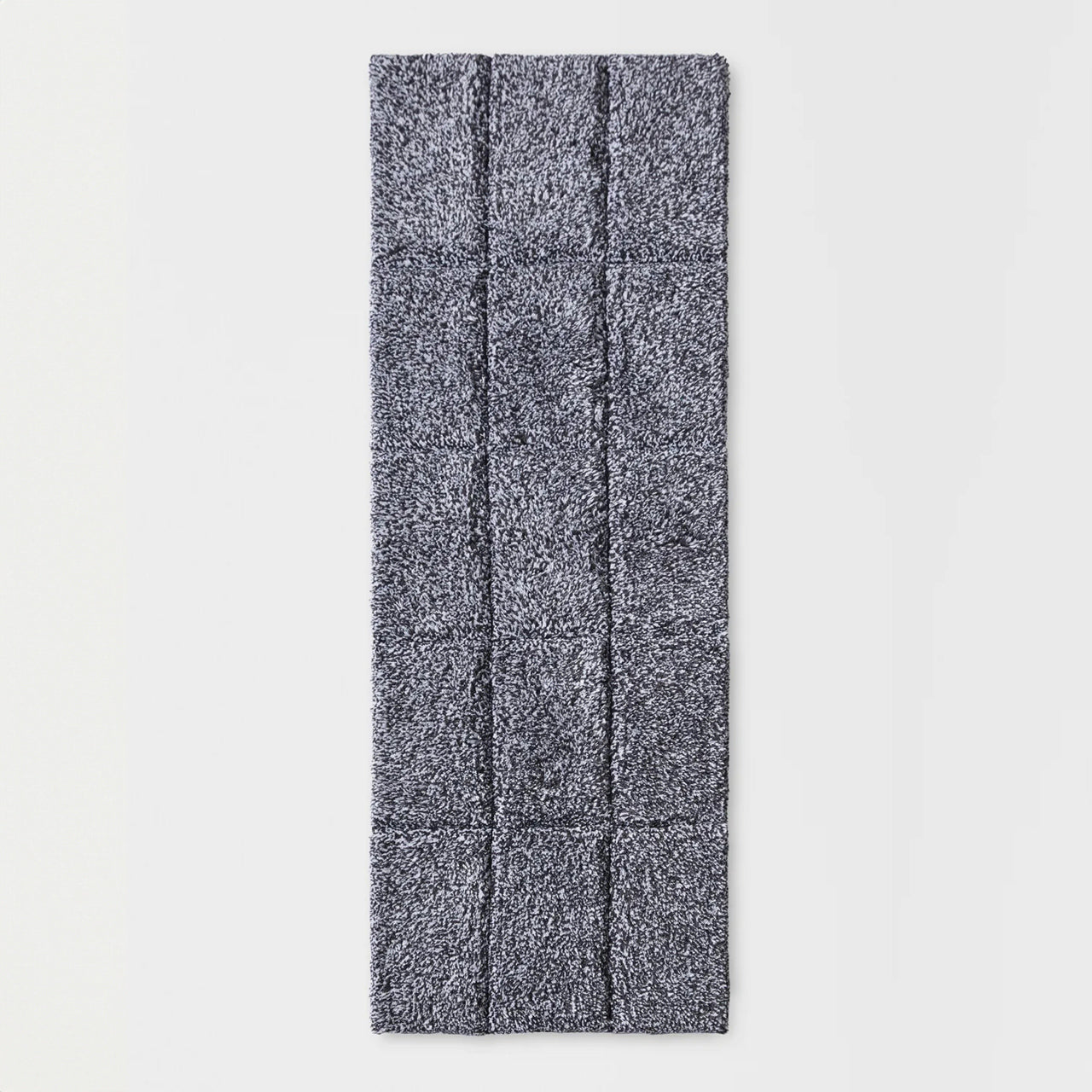 Cooper Tufted Bath Runner Charcoal on a white background