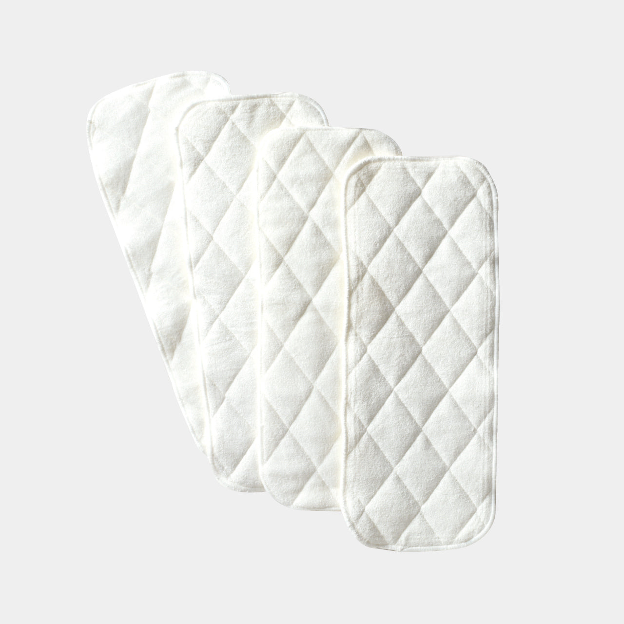 Nappy liners on a white background