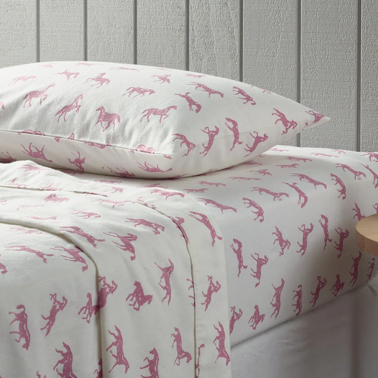 Side view of Dreamer Flannelette Sheets on bed