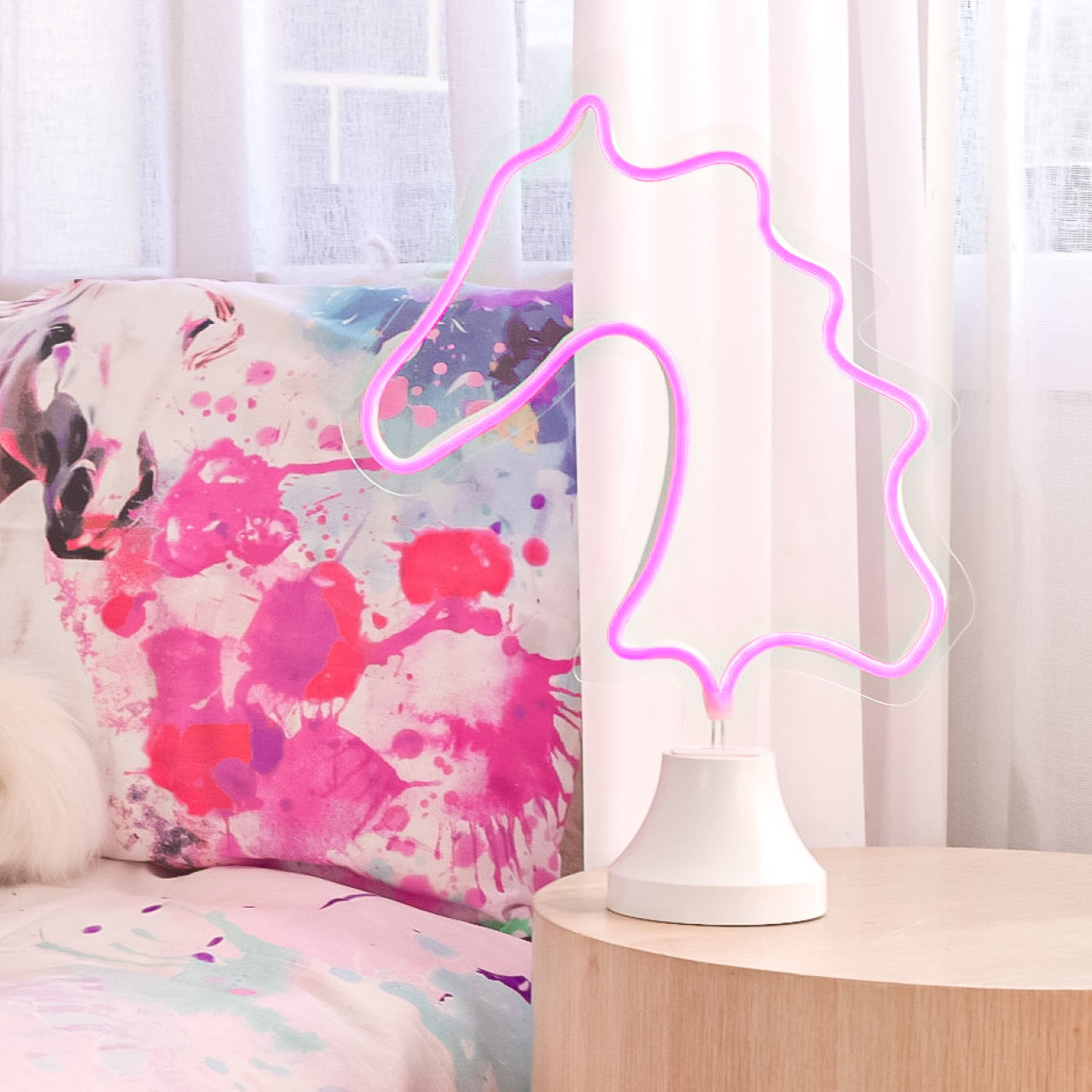 Lifestyle shot of Dreamer Horse Neon Light  next to bed