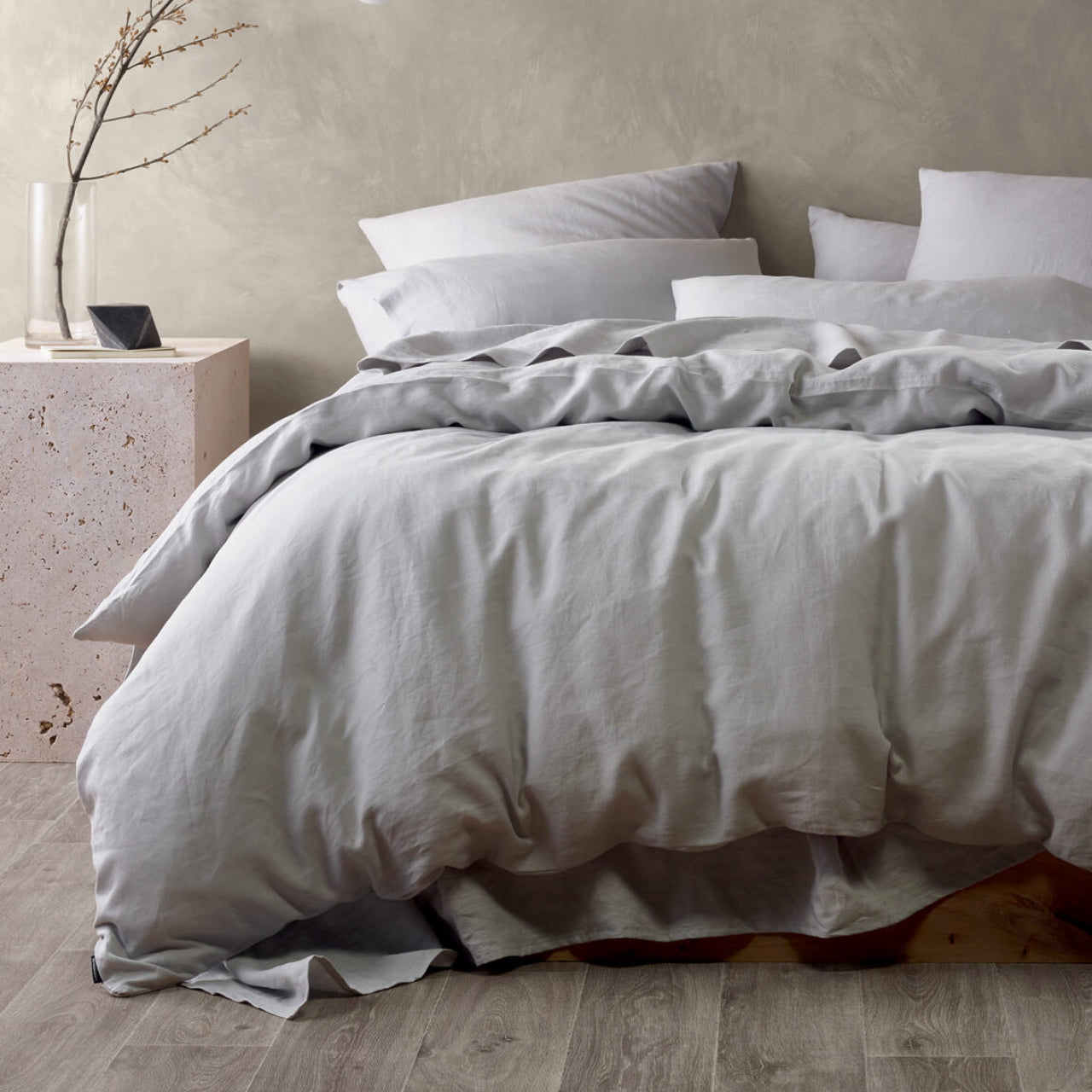 Front on shot of Elayna Quilt Cover Silver styled on bed