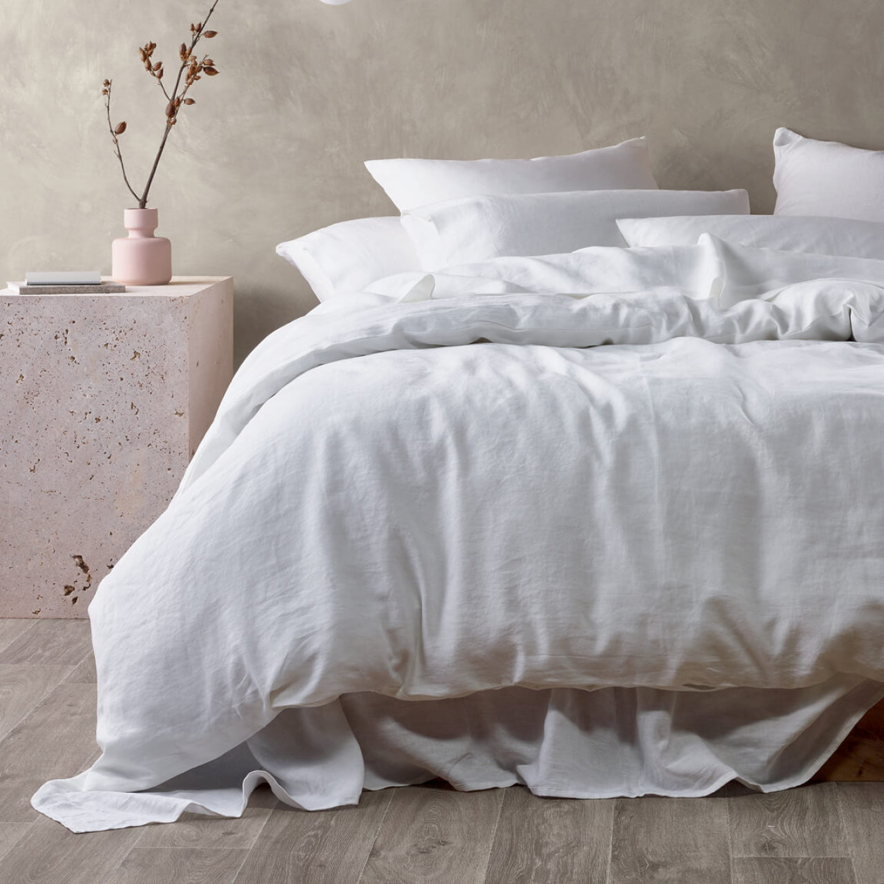 Front on shot of Elayna Quilt Cover White styled on bed