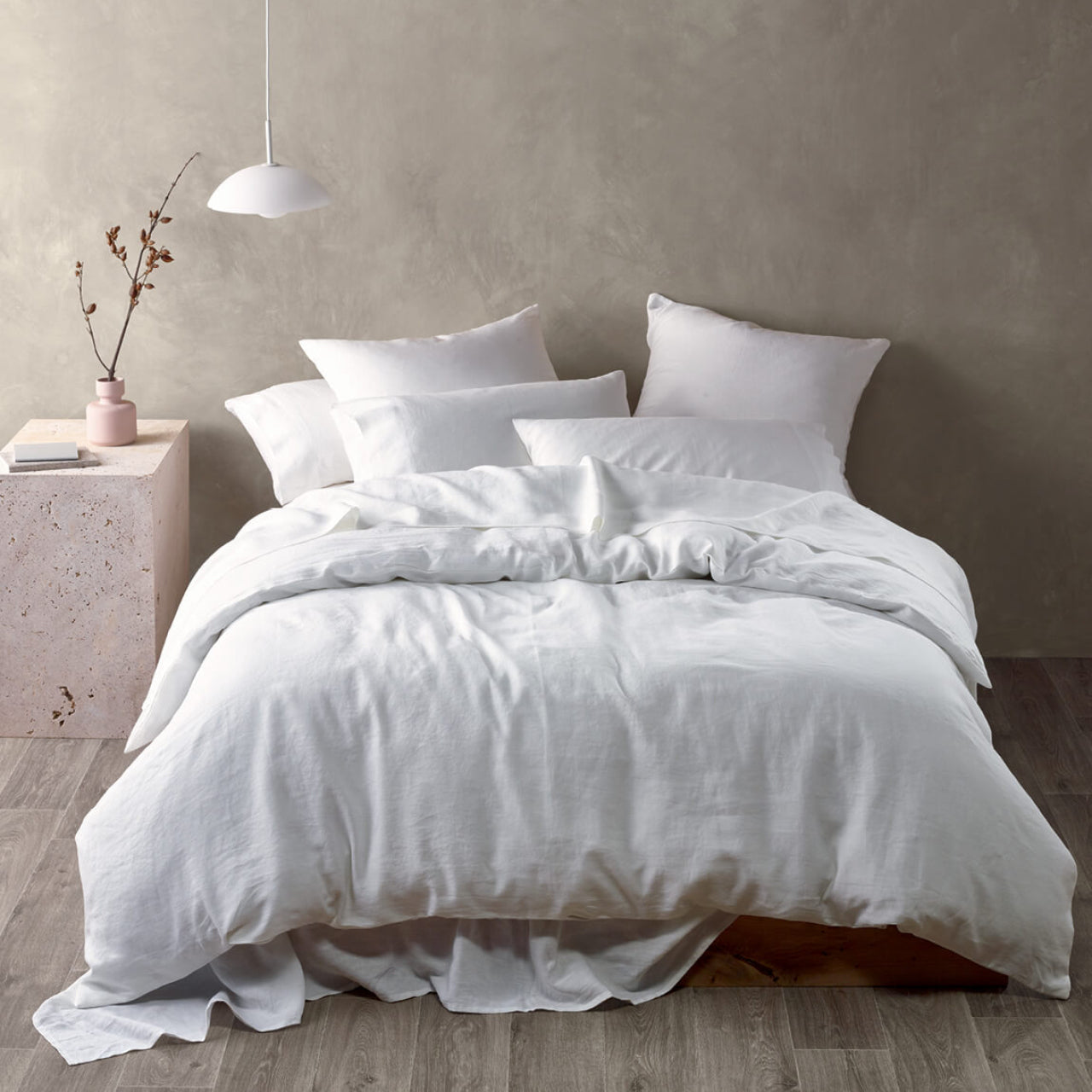 Zoomed out shot of Elayna Quilt Cover White on bed