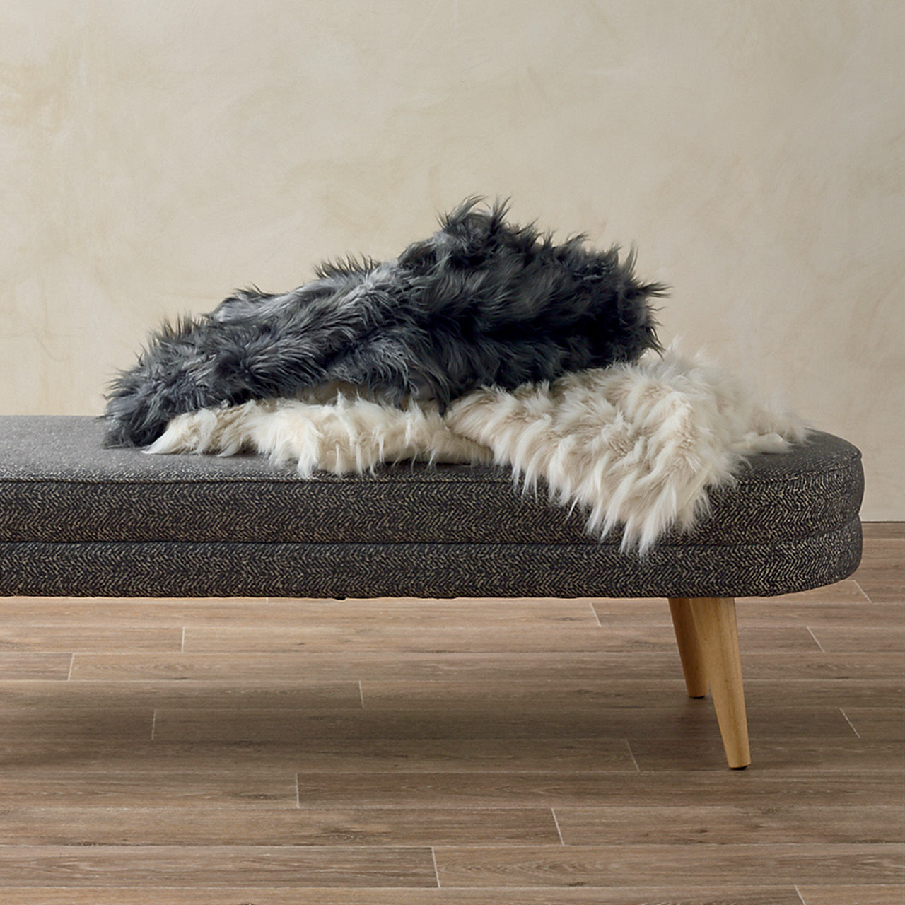 Group shot of Feathertop Throw Rugs on a stool