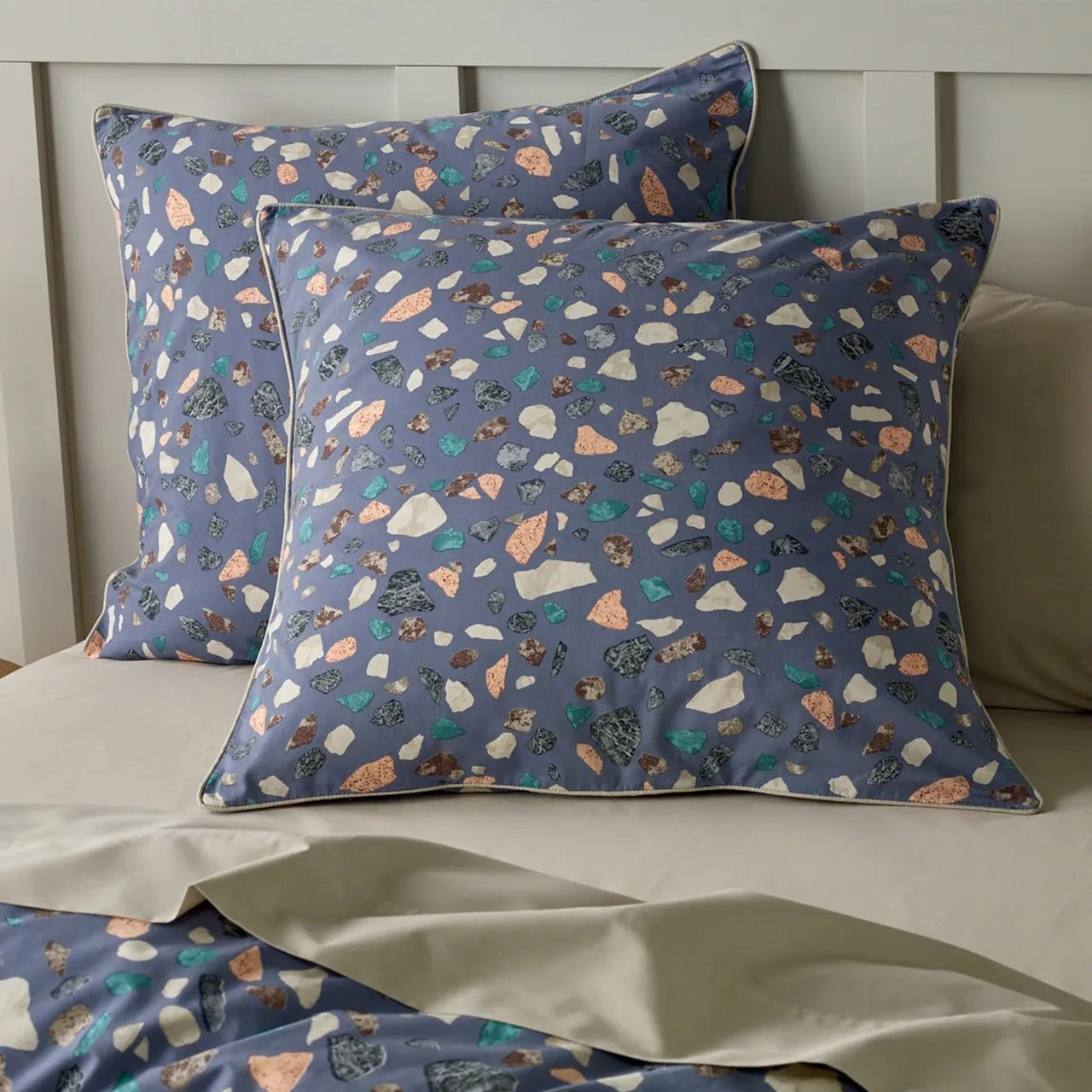 Close up shot of Gemstone European Pillowcases on bed