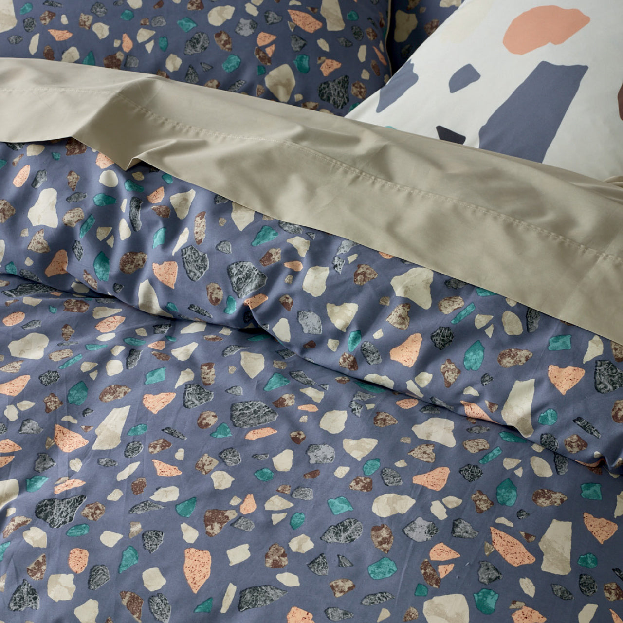 Close up shot of Gemstone Quilt Cover on bed