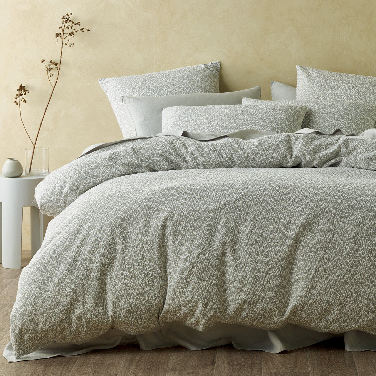 Zoomed out shot of Georgia Quilt Cover on bed