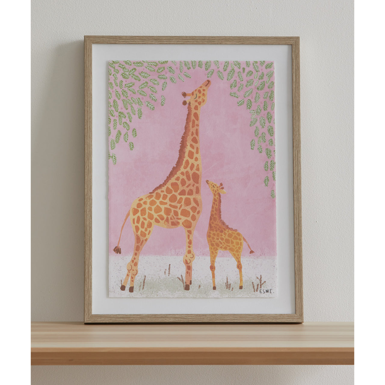 Giraffe Wall Art against wall on ledge