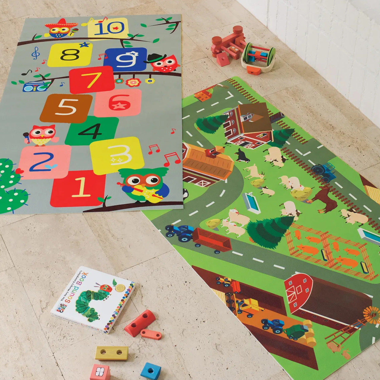 Group shot of Kids Playmats on floor with toys