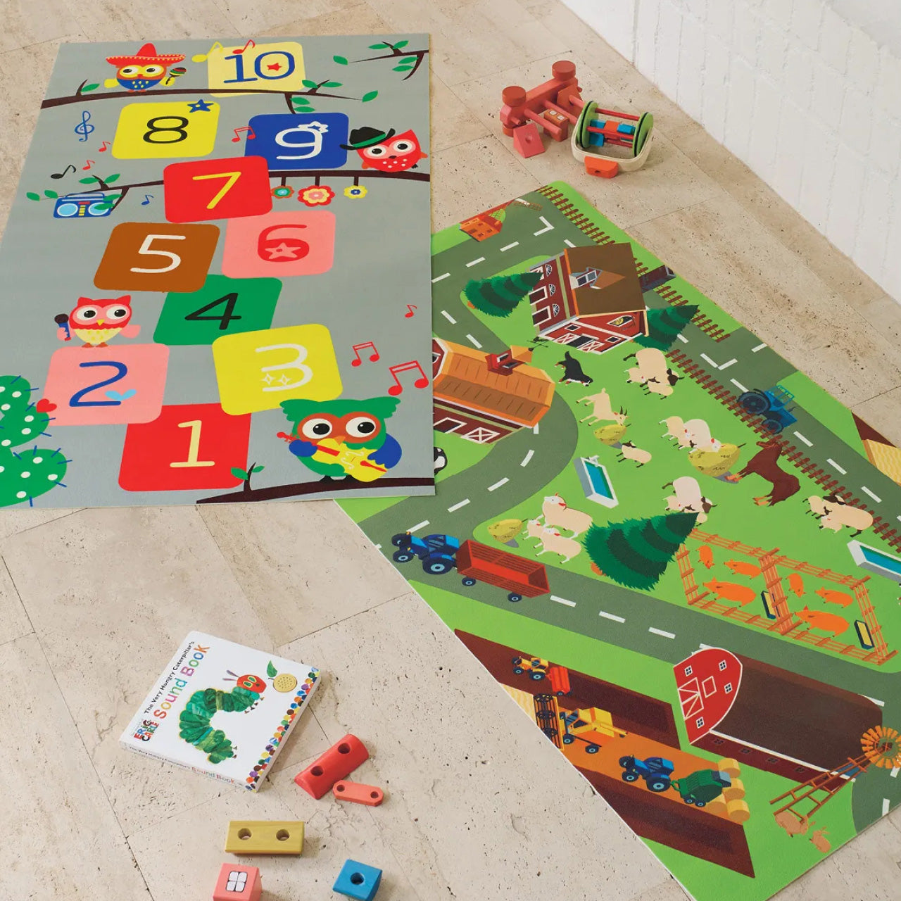 Group shot of Kids Playmats on floor with toys