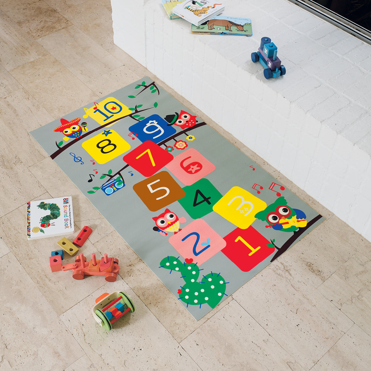 Kids Hopscotch Playmat on floor with toys