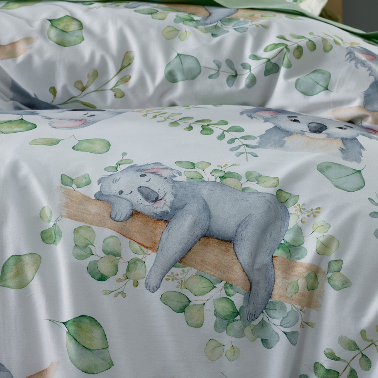 Close up shot of Koala Quilt Cover on bed