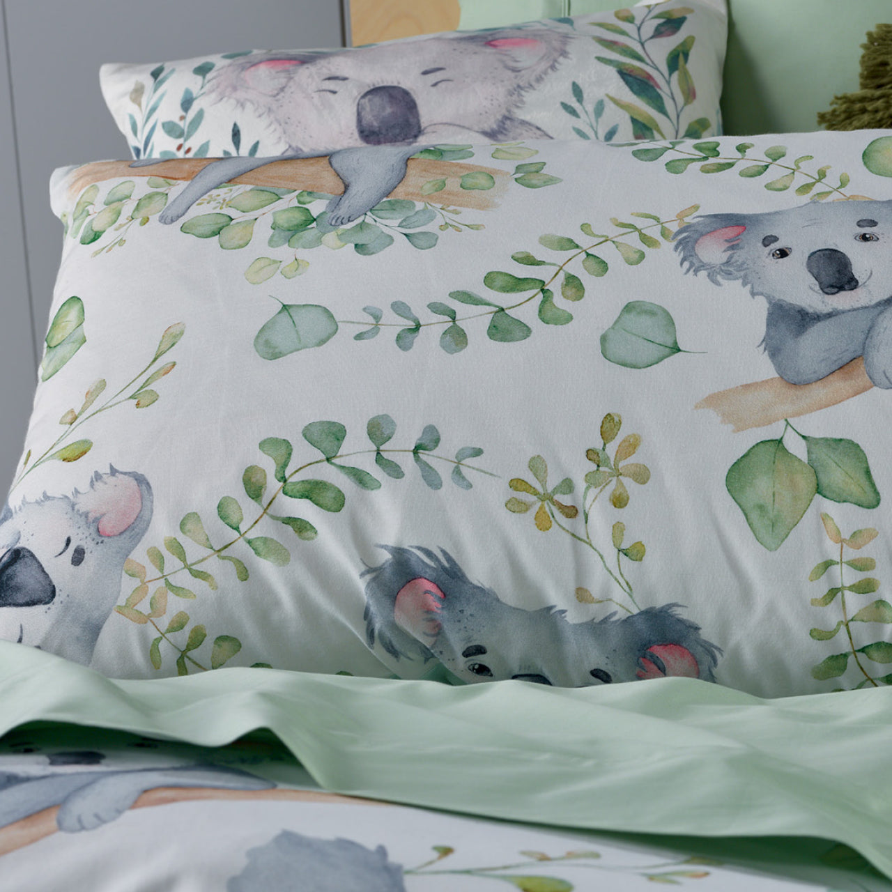 Close up shot of Koala Pillowcases on bed