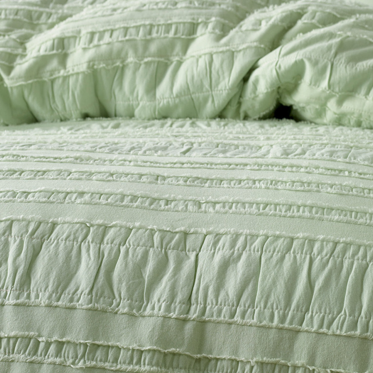 Close up shot of Madison Quilt Cover Set on bed