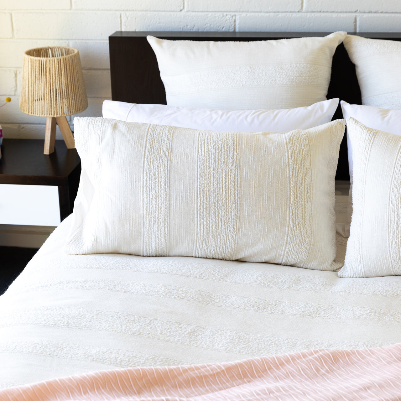 Mykonos Quilt Cover Set styled on bed with pillowcases