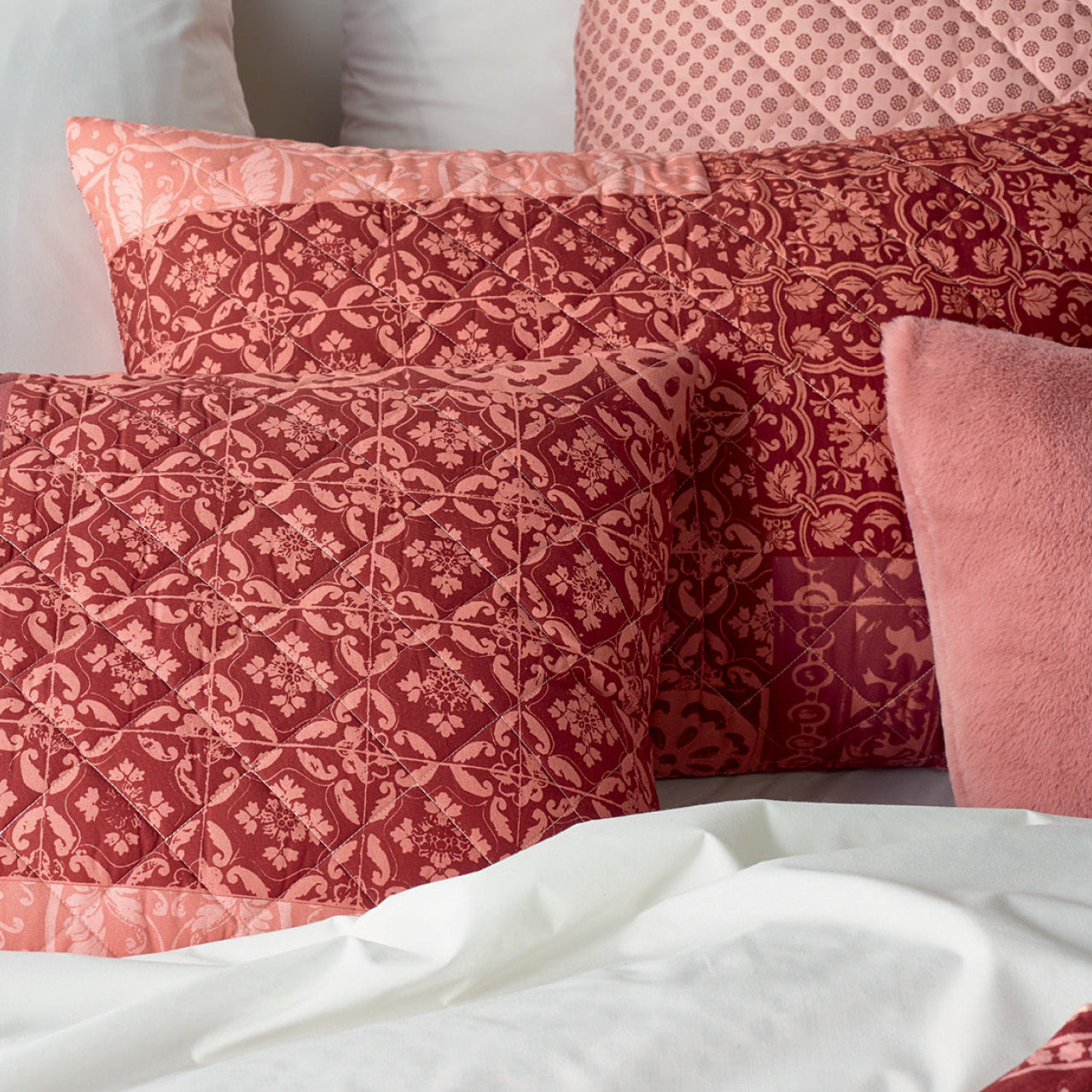 Close up shot of Narida Pillowcases on bed