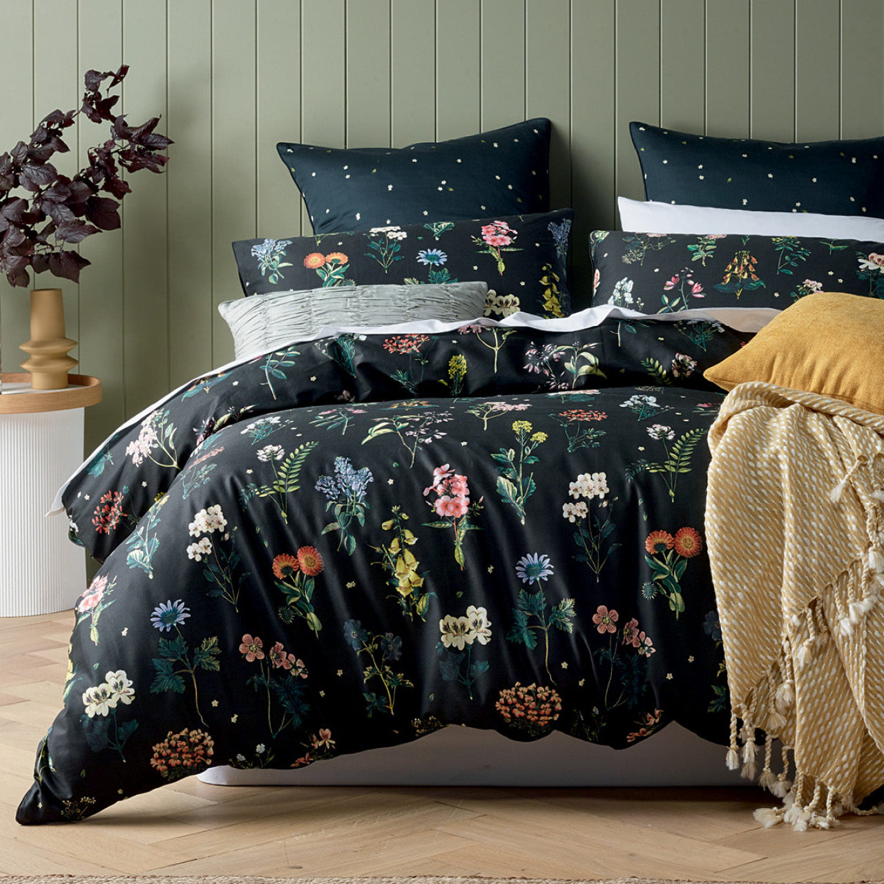 Zoomed out shot of Netta Quilt Cover Set on bed