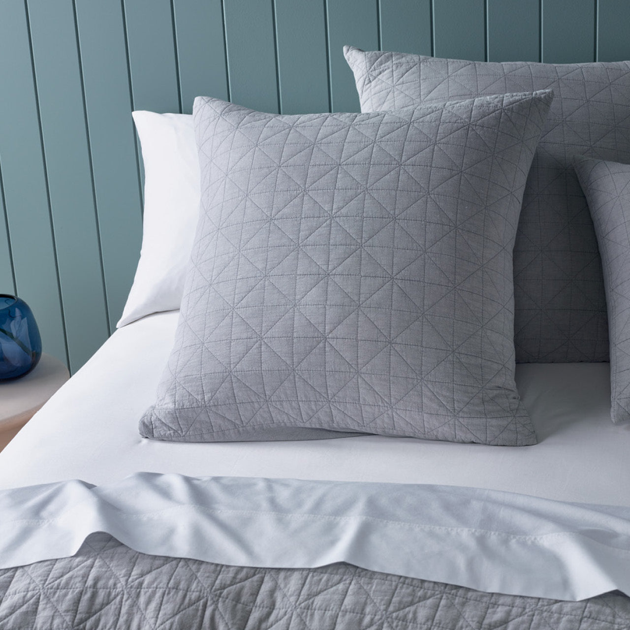 Zoomed in shot of Oliver European Pillowcases on bed