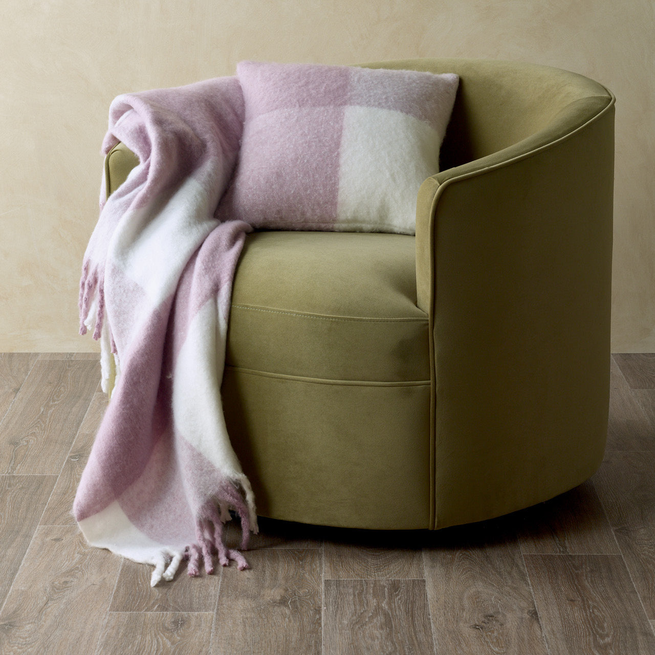 Penelope Cushion Cover and Throw Lavender on a chair