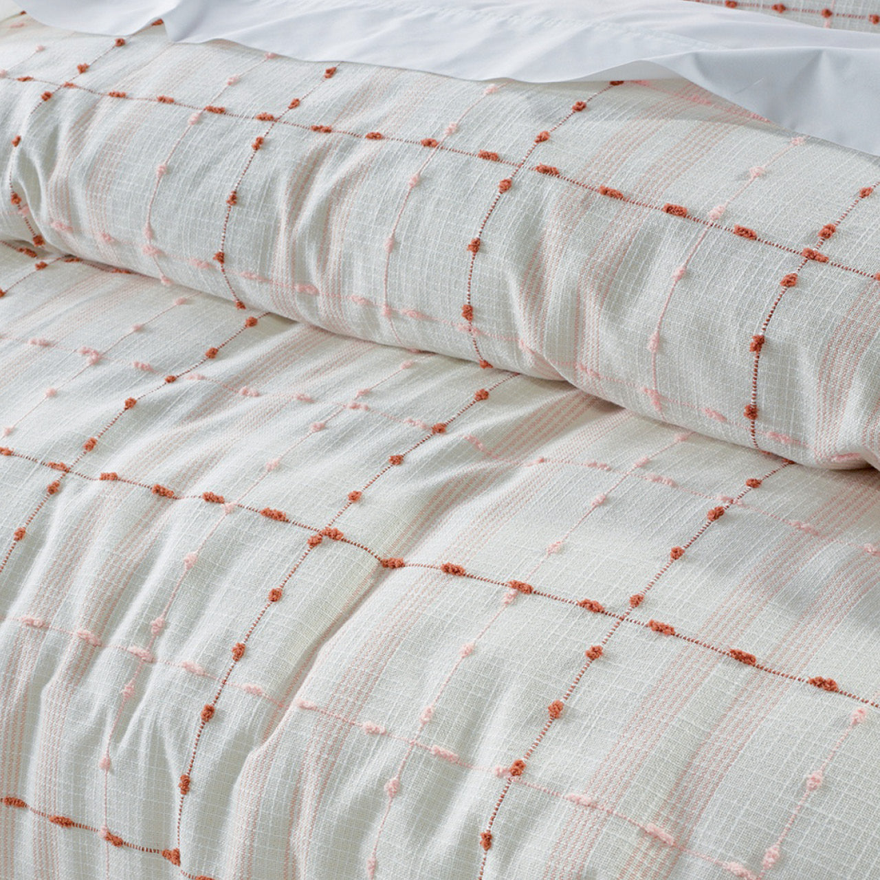 Close up shot of Phoebe Quilt Cover Set on bed