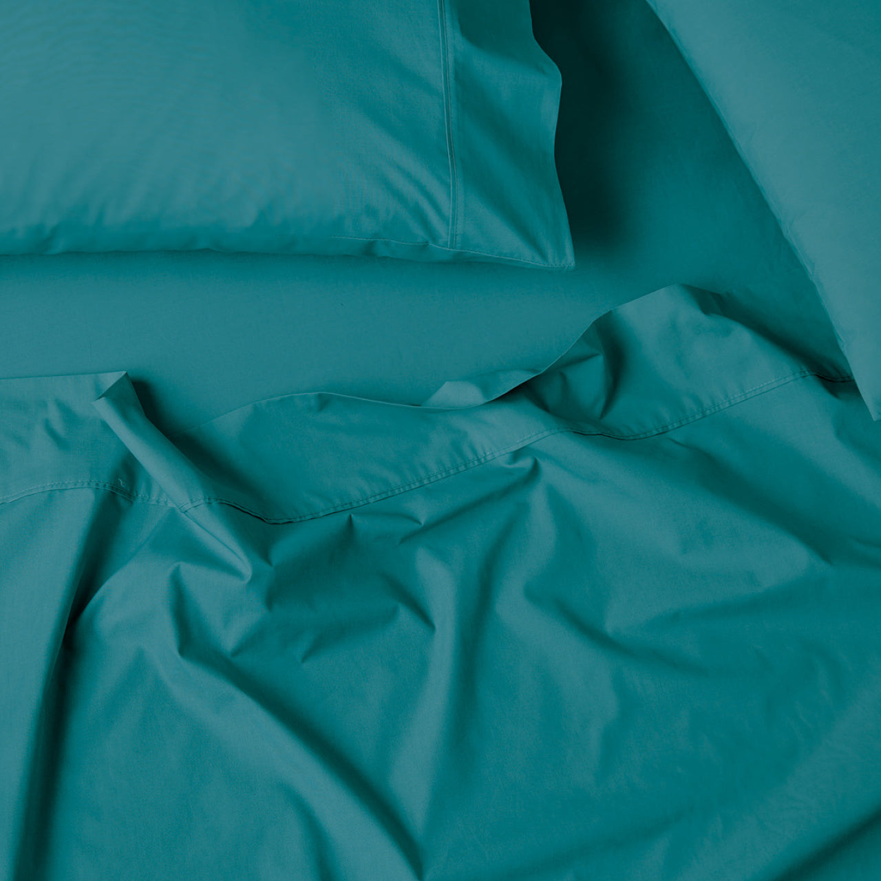 Close up shot of Premium Percale Teal Sheets 