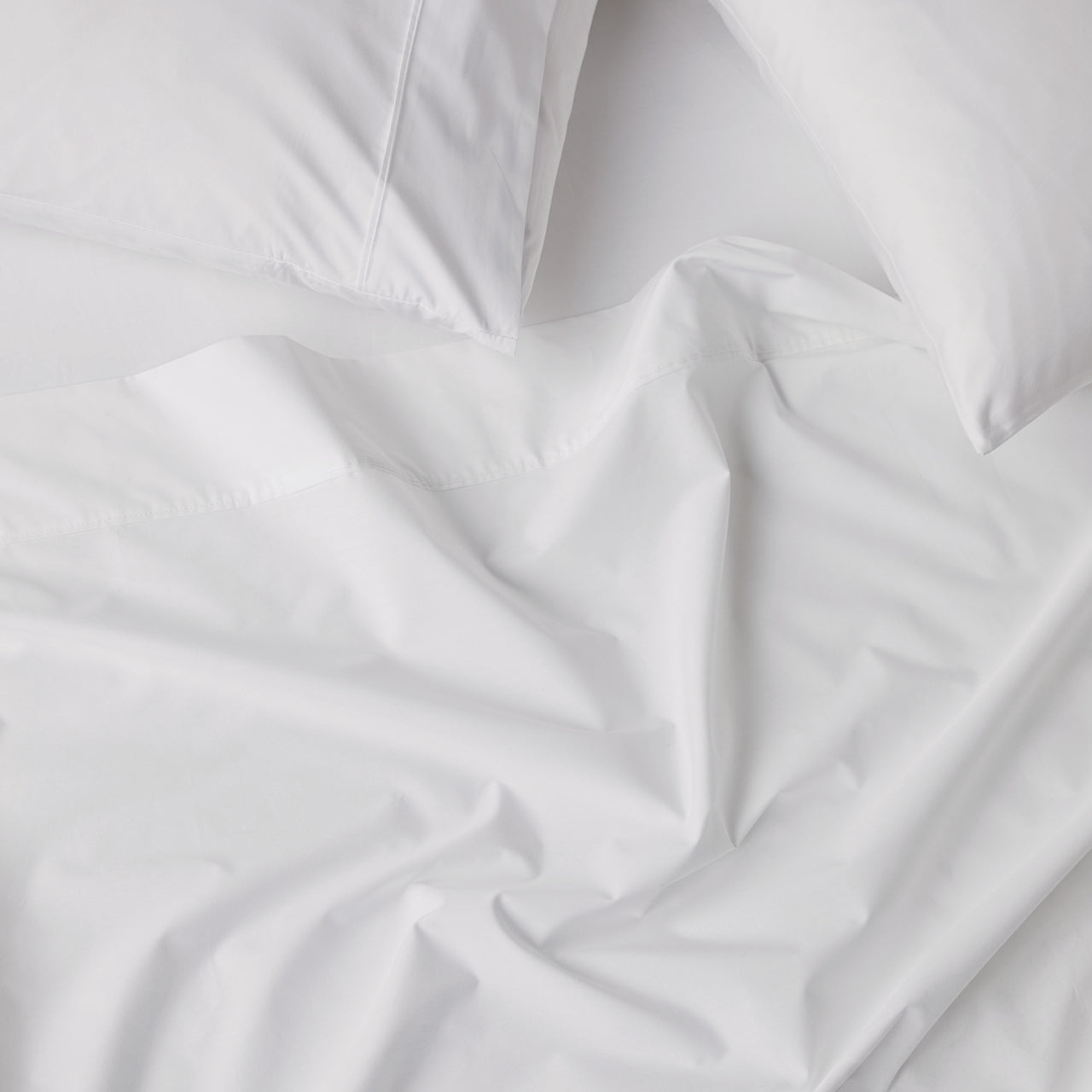 Close up shot of Premium Percale White Sheets
