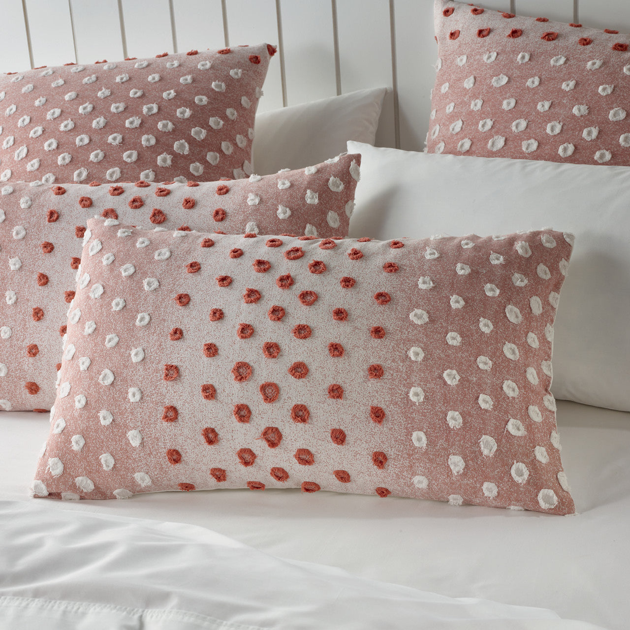 Close up shot of Ruby Pillowcases on bed