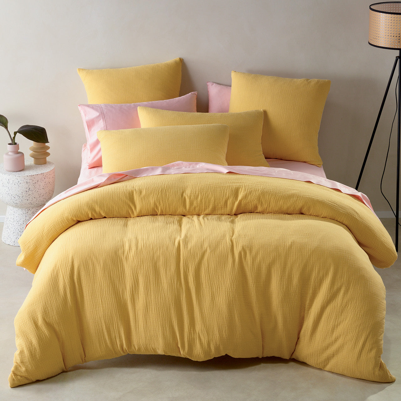 Zoomed out shot of Saffron Quilt Cover Set on bed