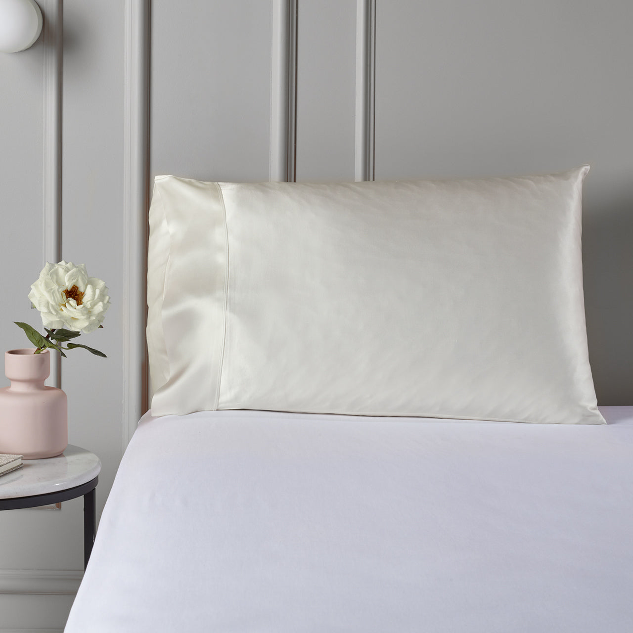 Close up of Silk Royale Pillowcase White on bed