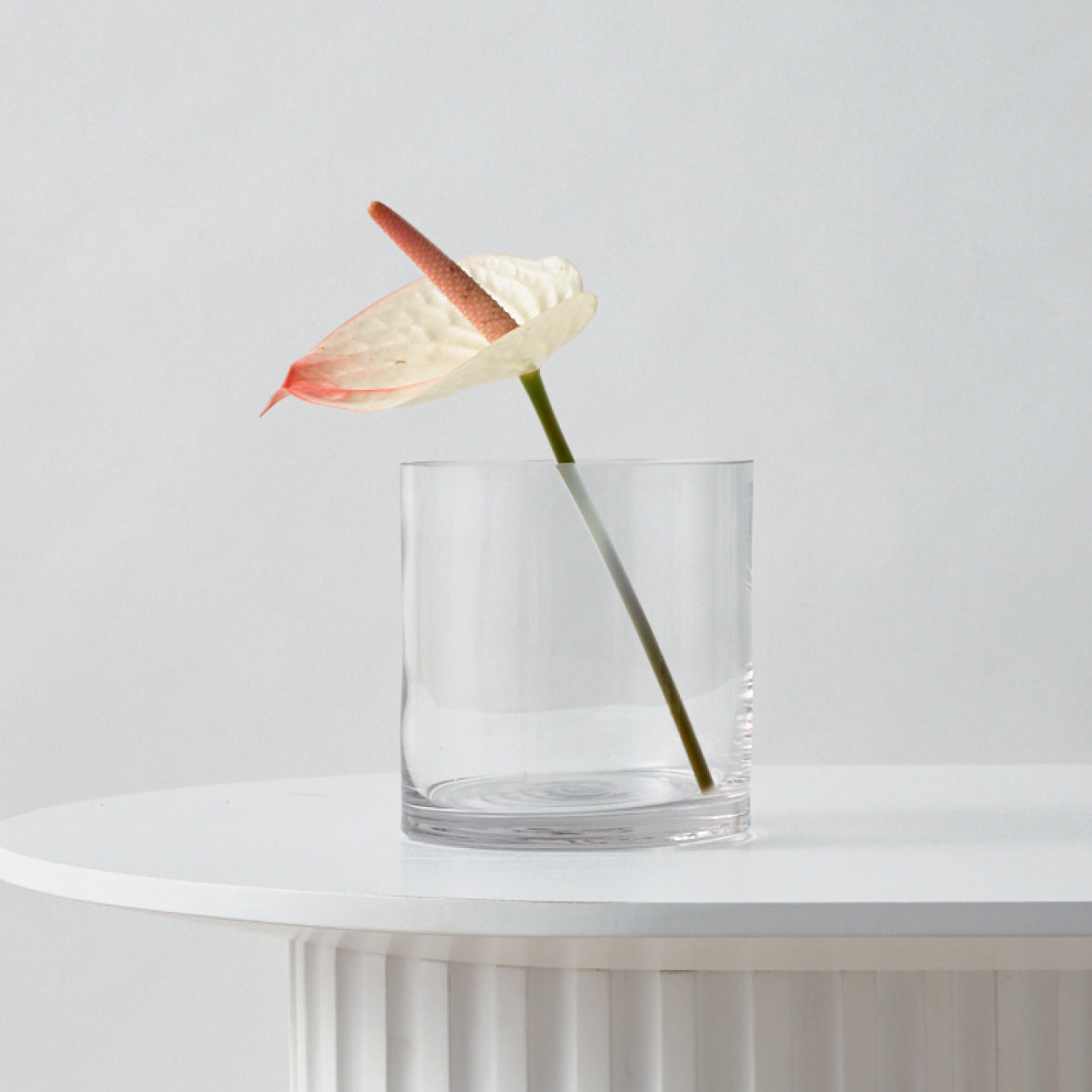 Solaire Vase on table with flower