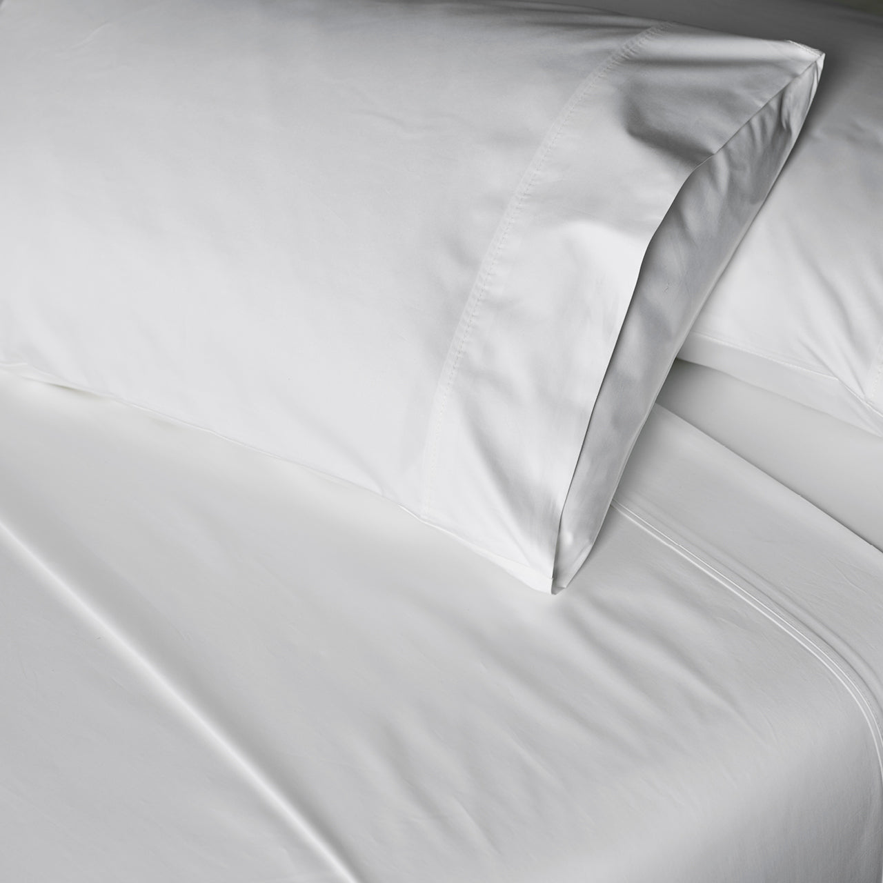 Zoomed in shot of Supima White Sheets and Pillowcase